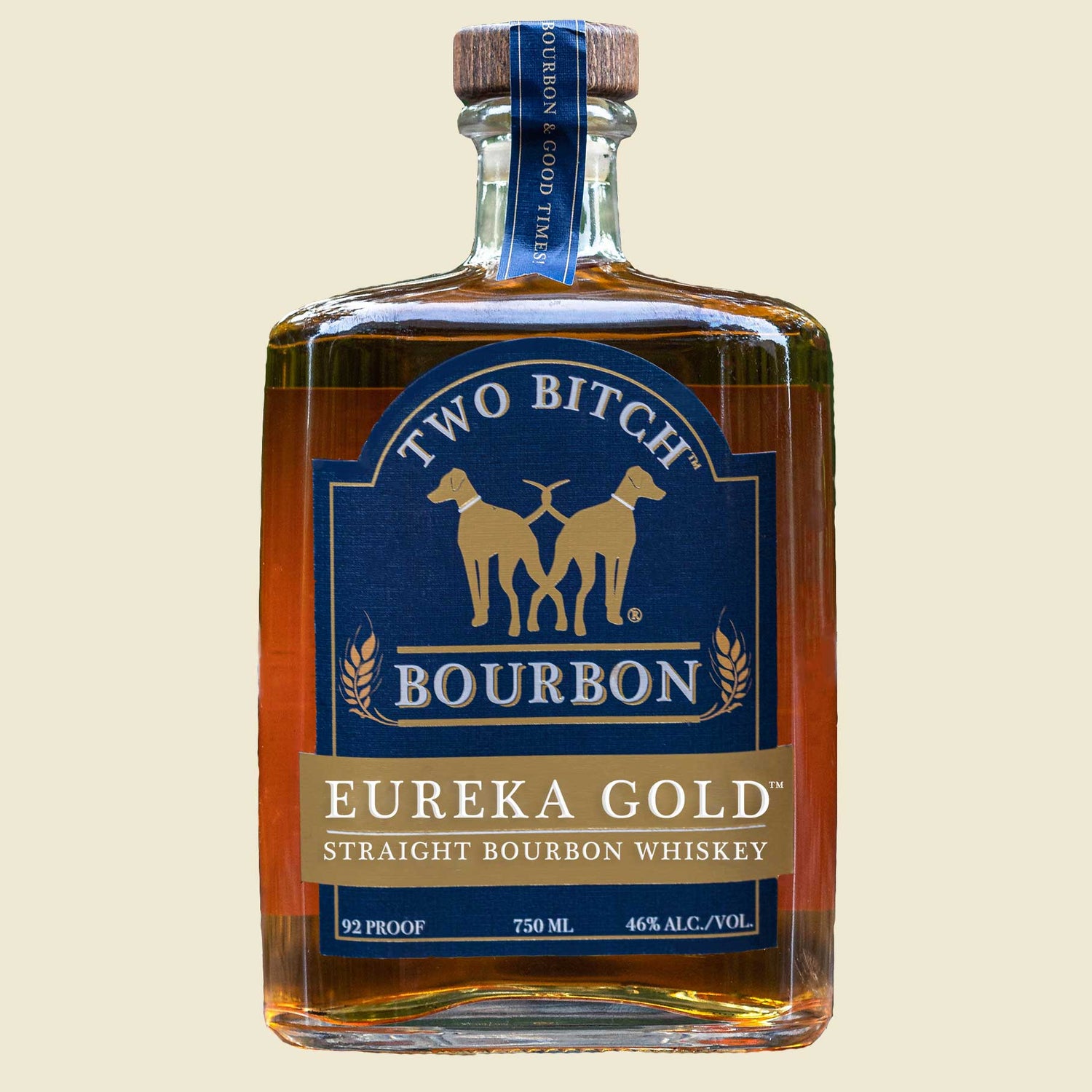 Bottle of Two Bitch Bourbon Eureka Gold on a beige background